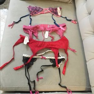 4 VS garter belts. NWT.